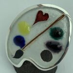 Ring in Form einer Farbpalette